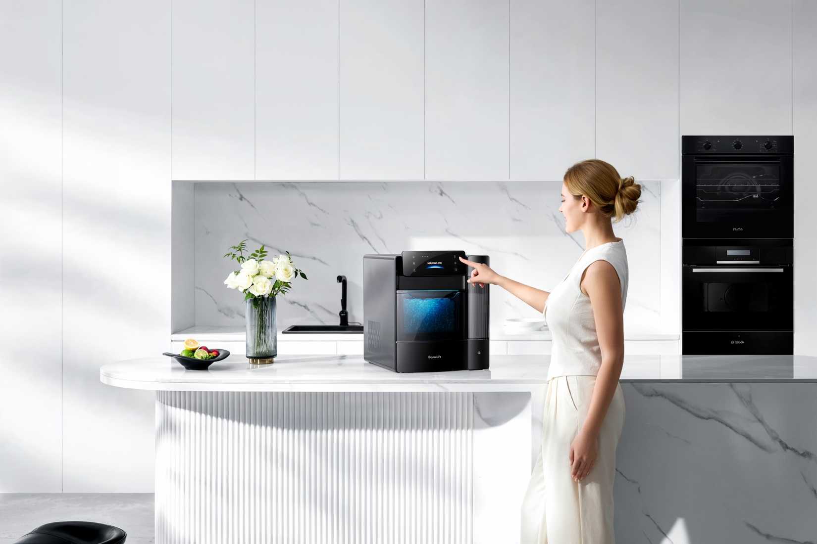 Woman operating an ice maker