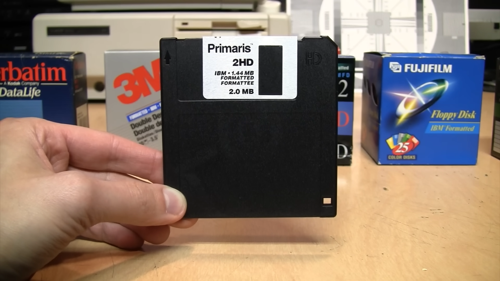A black 3.5-inch Primaris floppy disk.