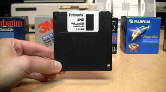 A black 3.5-inch Primaris floppy disk.