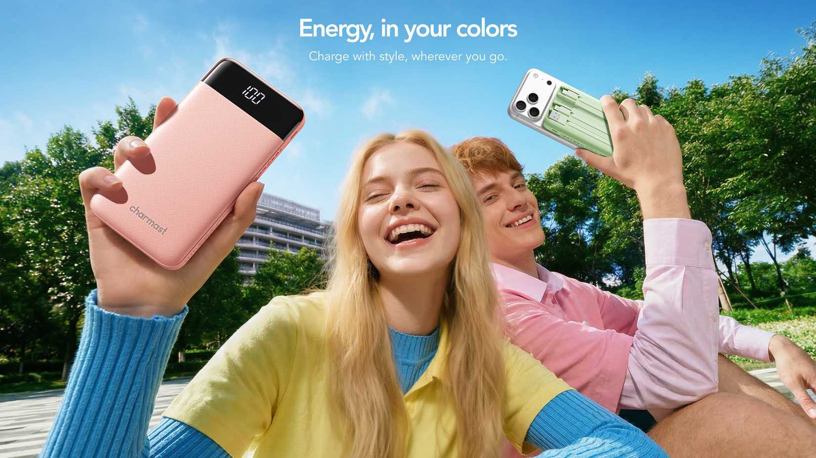 Two people holding the Charmast Portable Charger in two different colors.