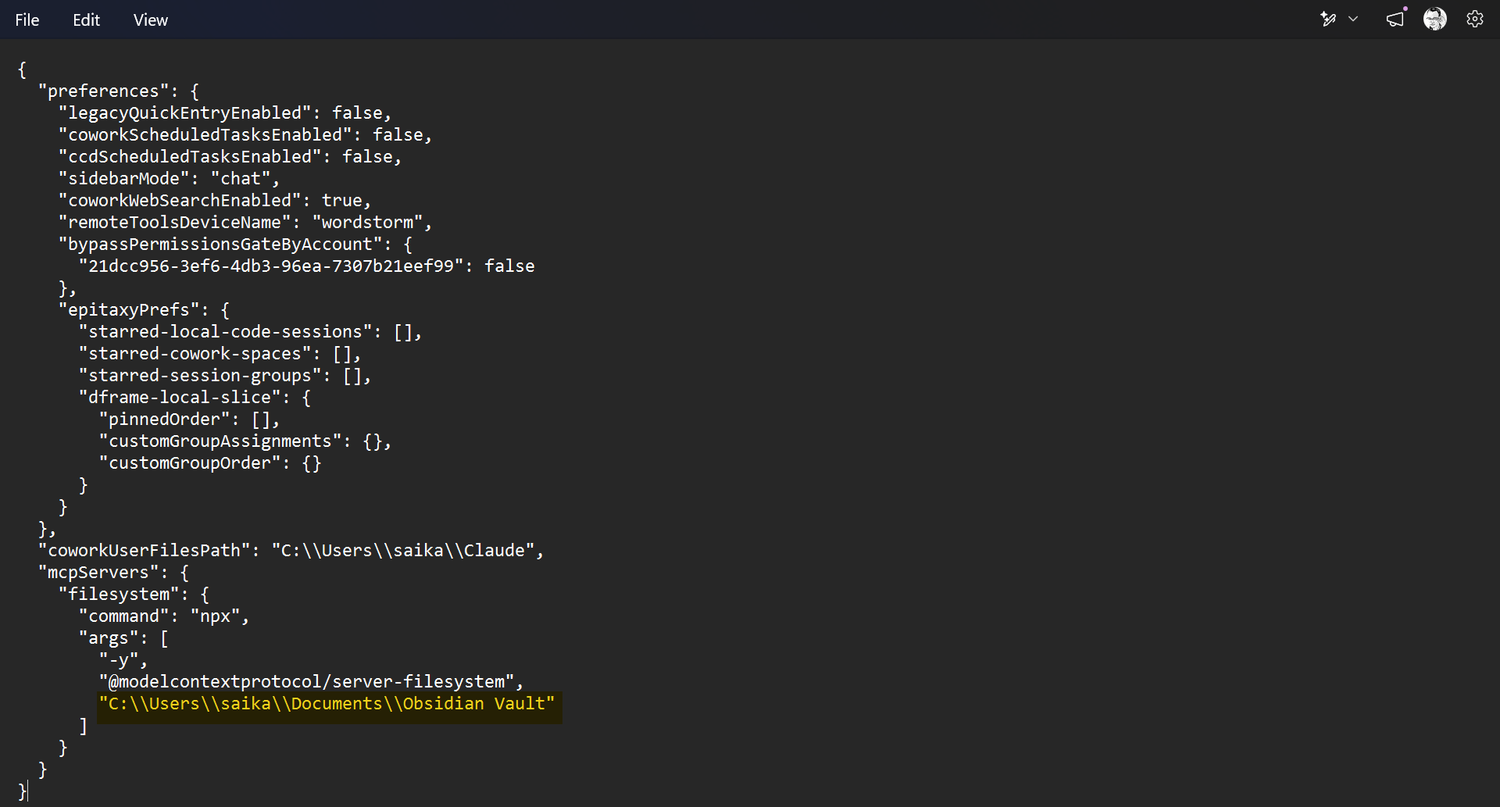 The claude_desktop_config.json file showing the Filesystem MCP server configured with an Obsidian vault path.