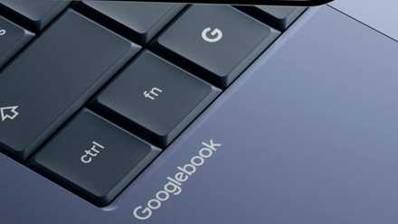 Close-up of Googlebook logo on the body of an Android laptop