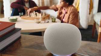A Google Home Speaker in Porcelain sitting on a table.