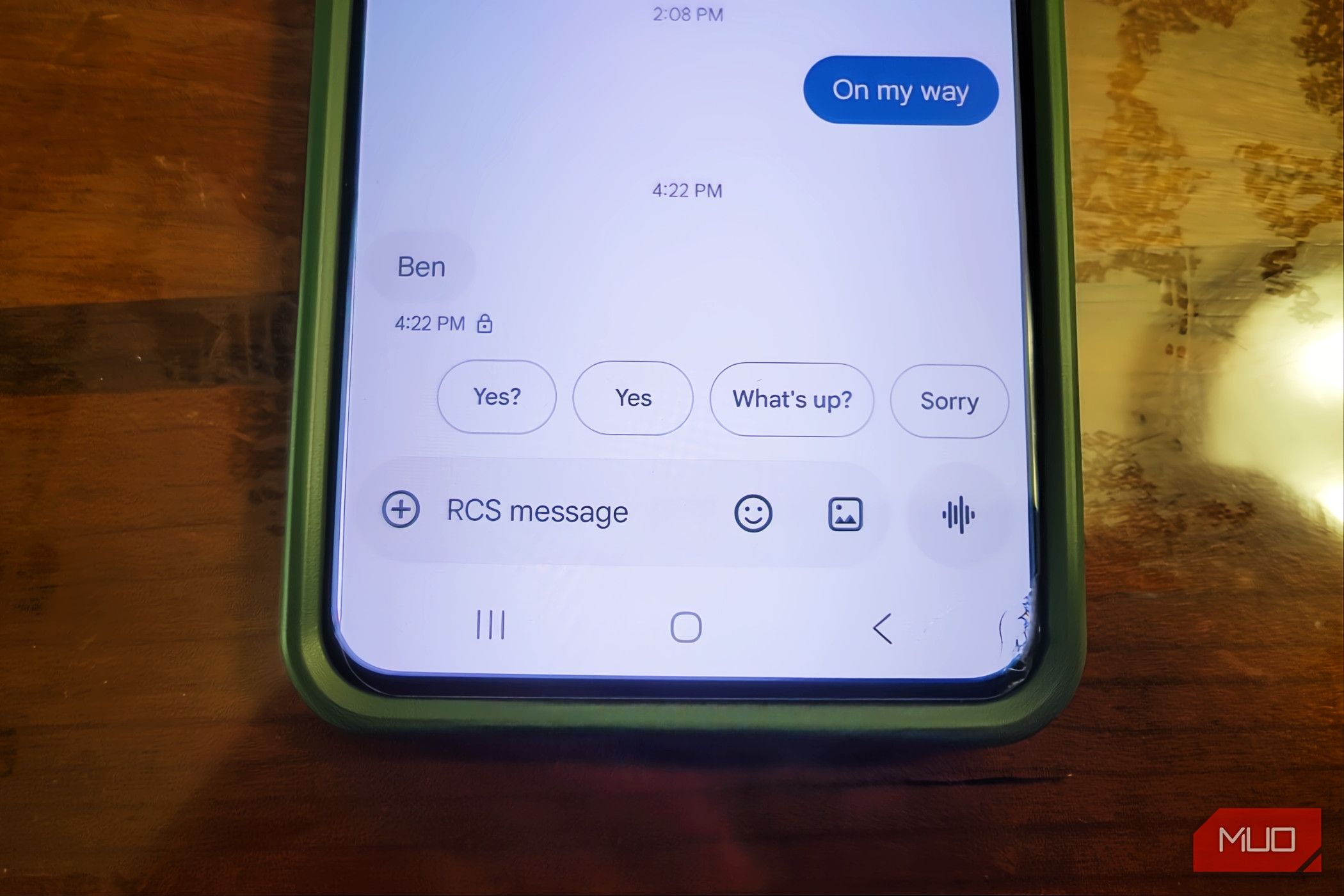 Phone showing messages on a messaging app.