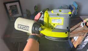 ryobi sander in hand