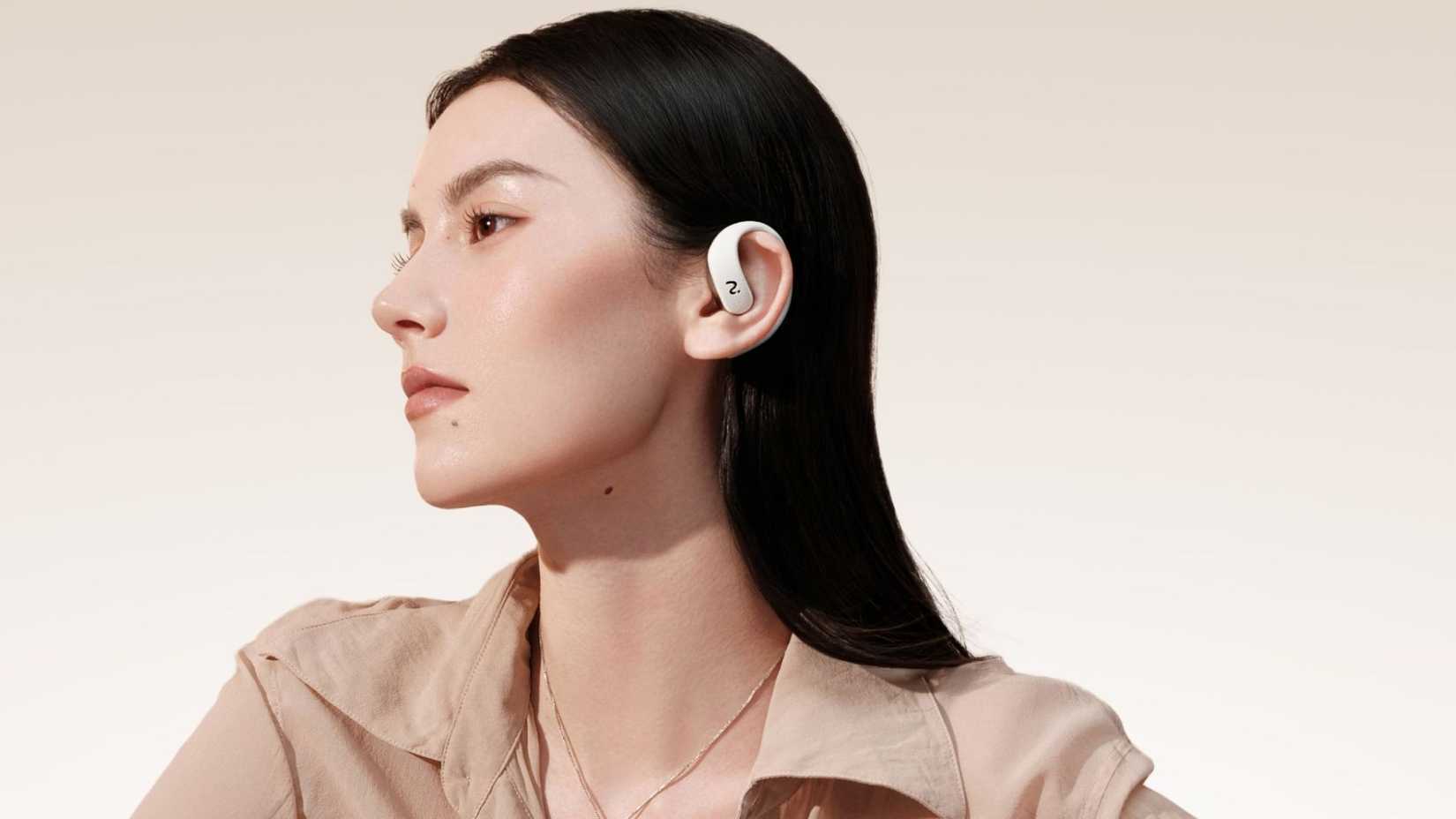 Woman wearing earbuds