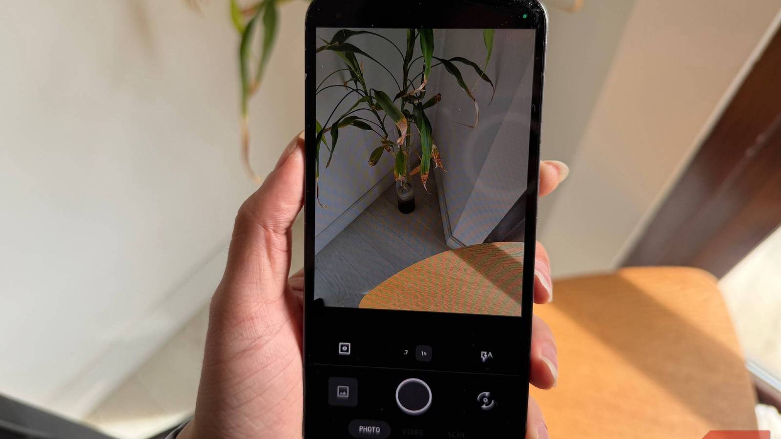 I turned off 4 phone camera features and finally stopped getting blurry photos