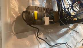 CyberPower 550VA UPS powering equipment in utility space