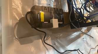 CyberPower 550VA UPS powering equipment in utility space