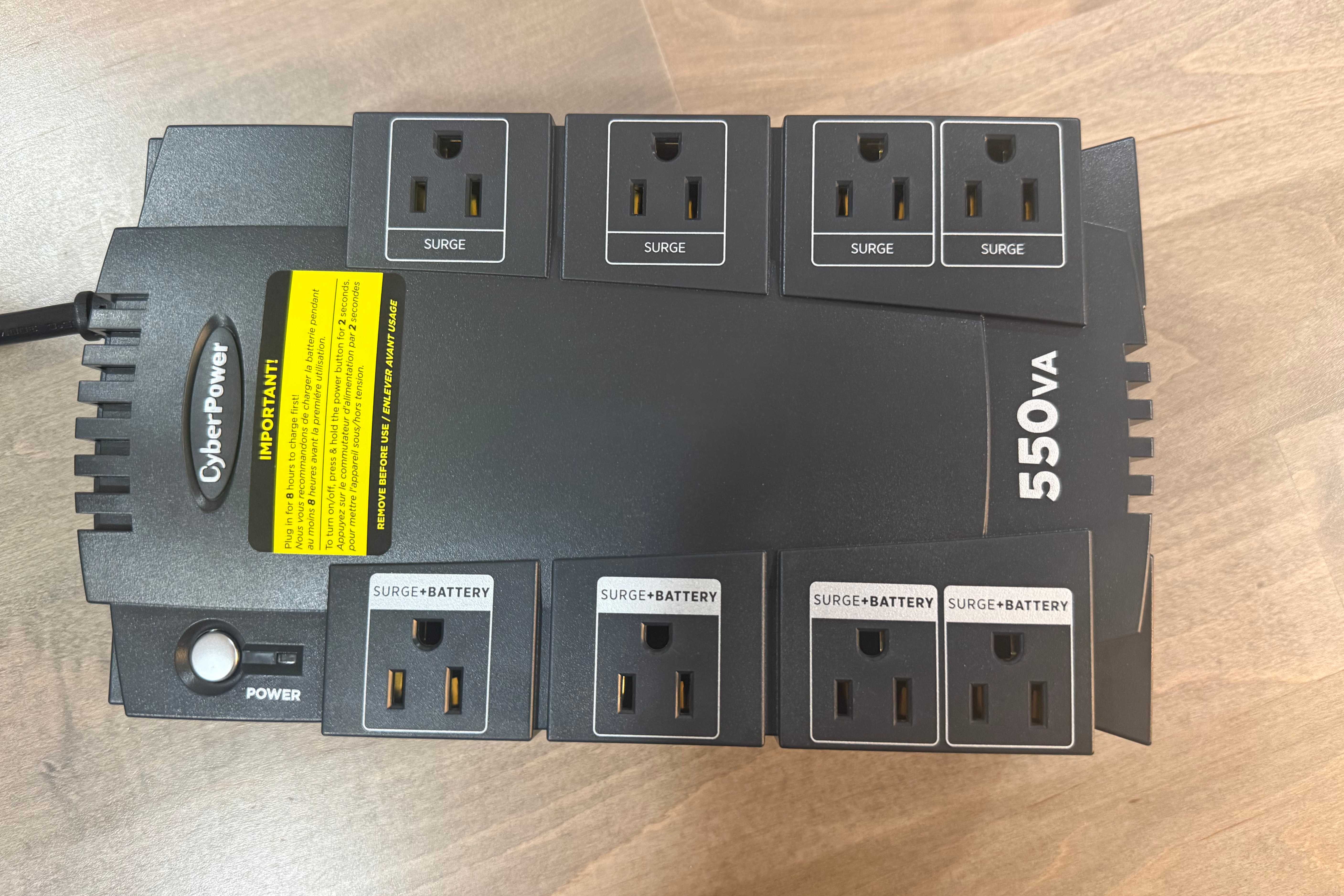 CyberPower 550VA UPS top view of surge and battery outlets