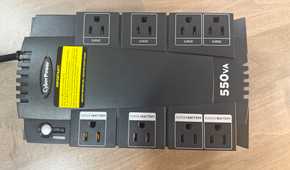 CyberPower 550VA UPS top view of surge and battery outlets