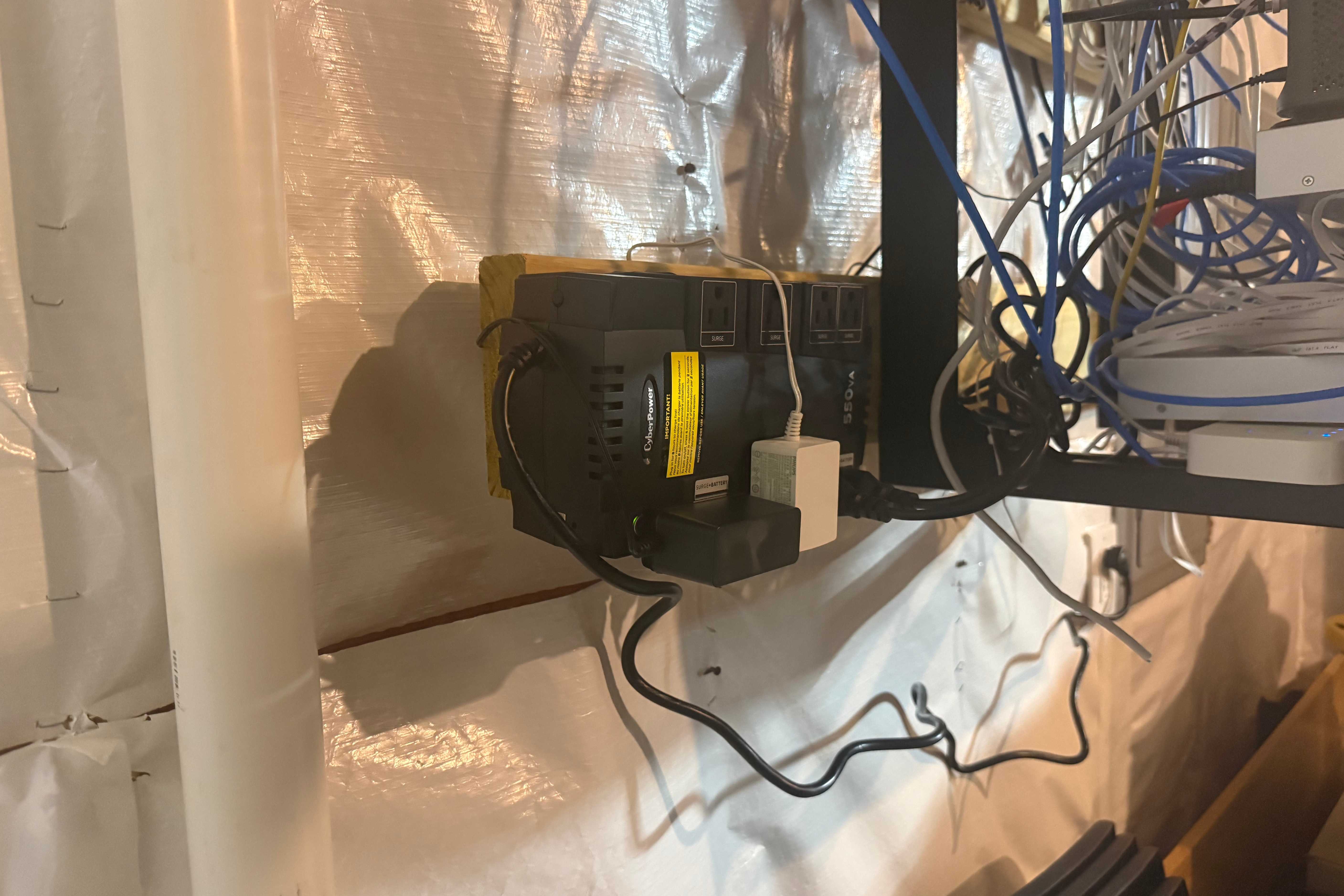 CyberPower UPS in basement near network equipment