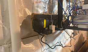 CyberPower UPS in basement near network equipment