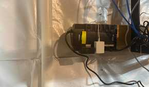 CyberPower UPS in utility area with device charging