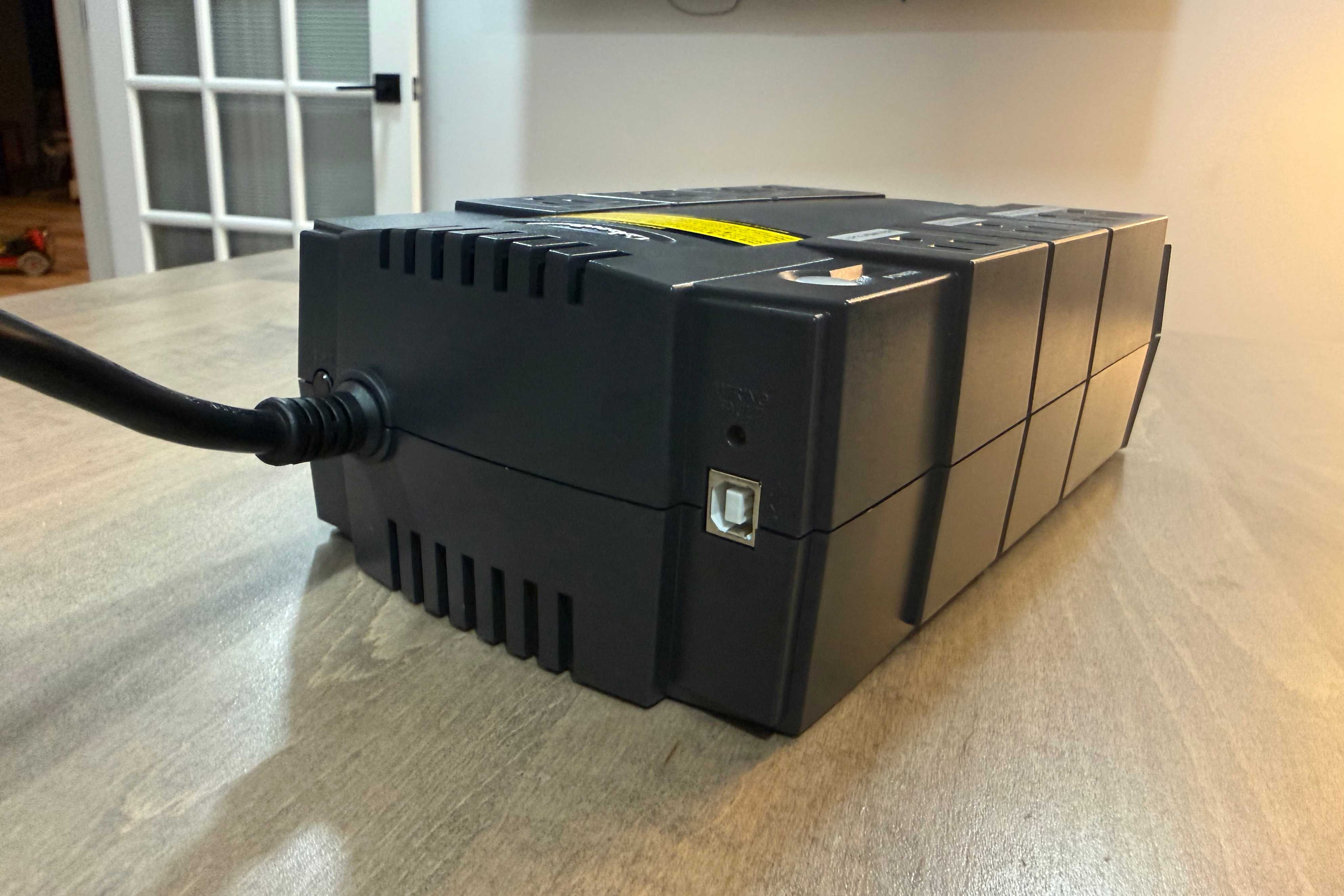 CyberPower UPS rear view with USB port and cooling vents