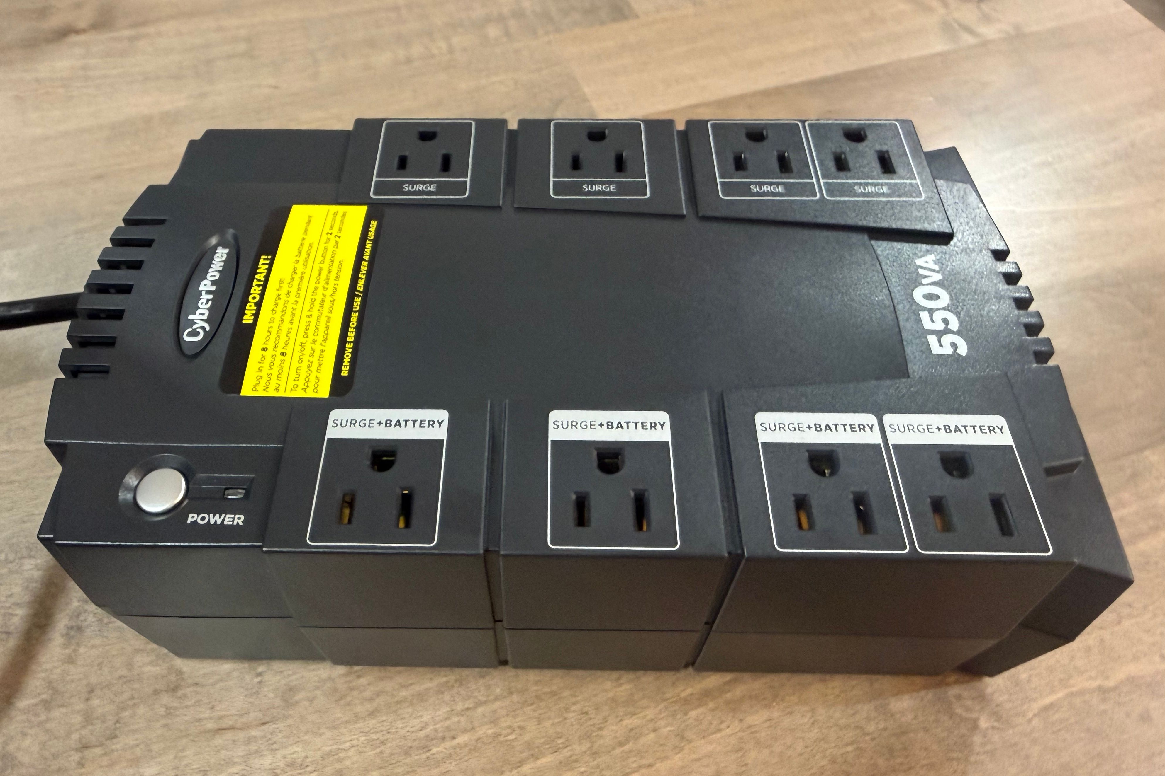 CyberPower UPS top view of eight outlets and power button