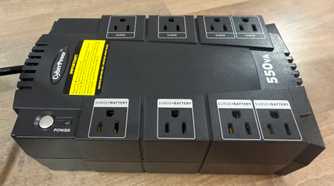 CyberPower UPS top view of eight outlets and power button