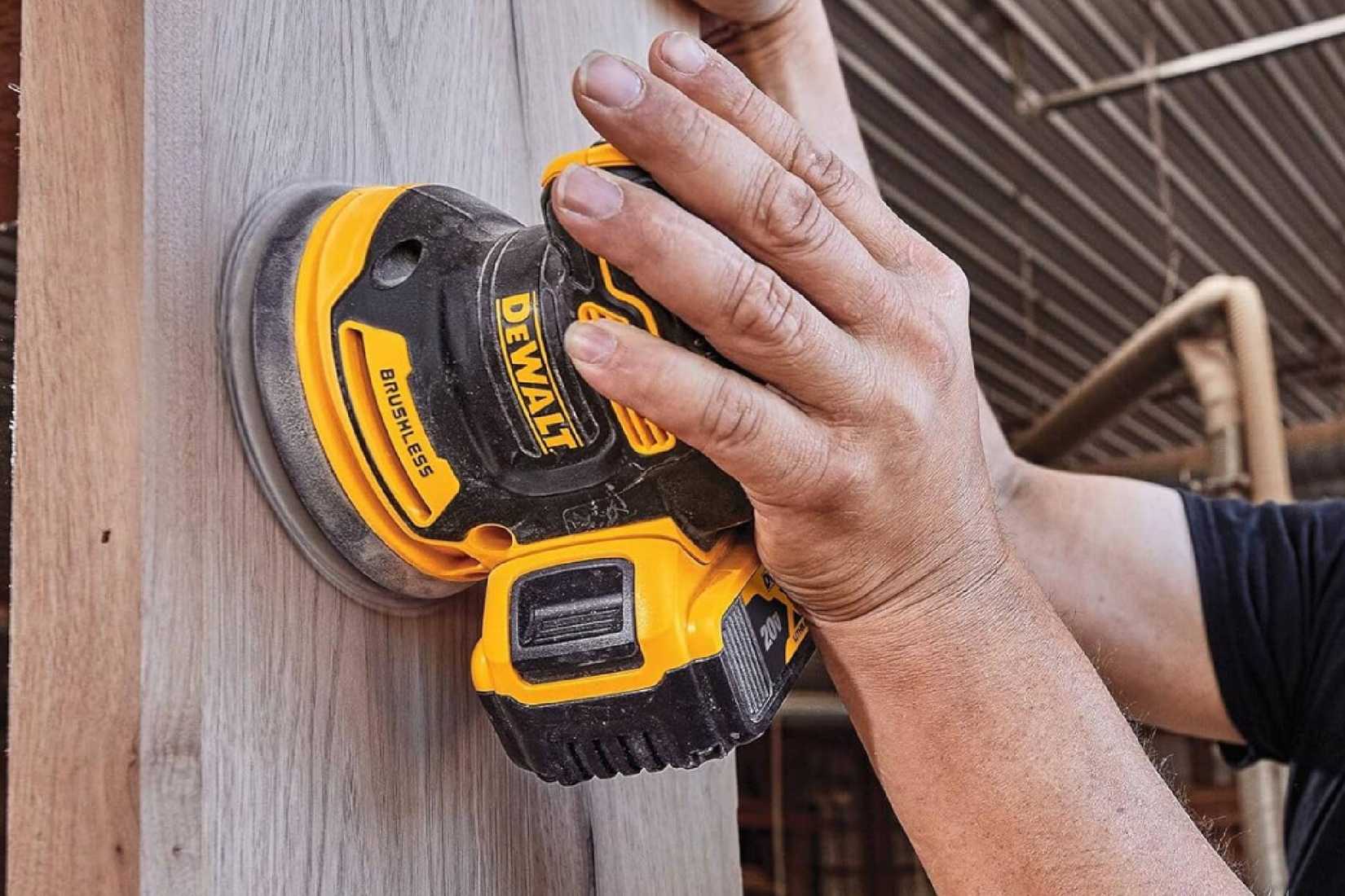 DEWALT 20V MAX Orbital Sander on a upright board