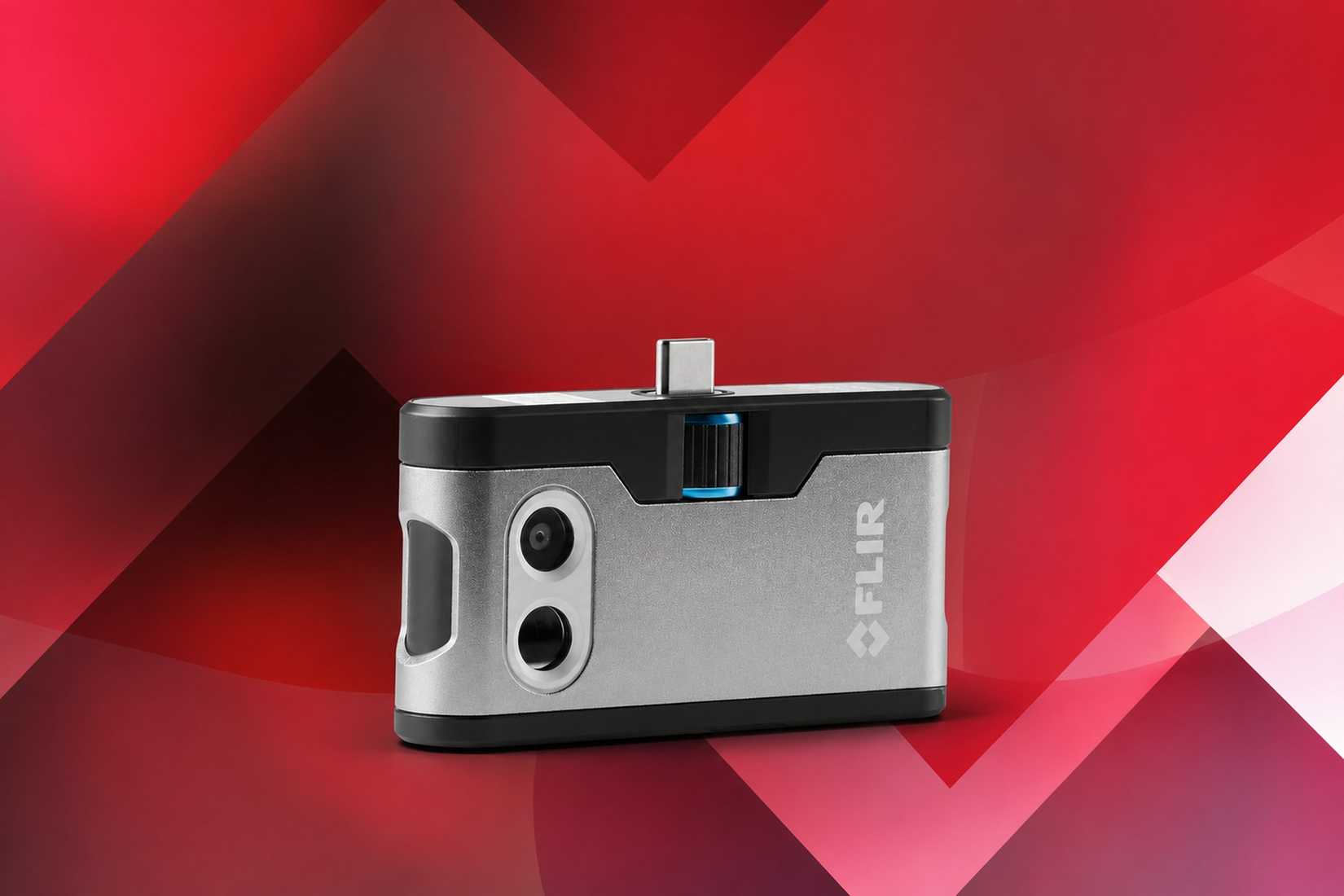 FLIR One thermal camera on red geometric background