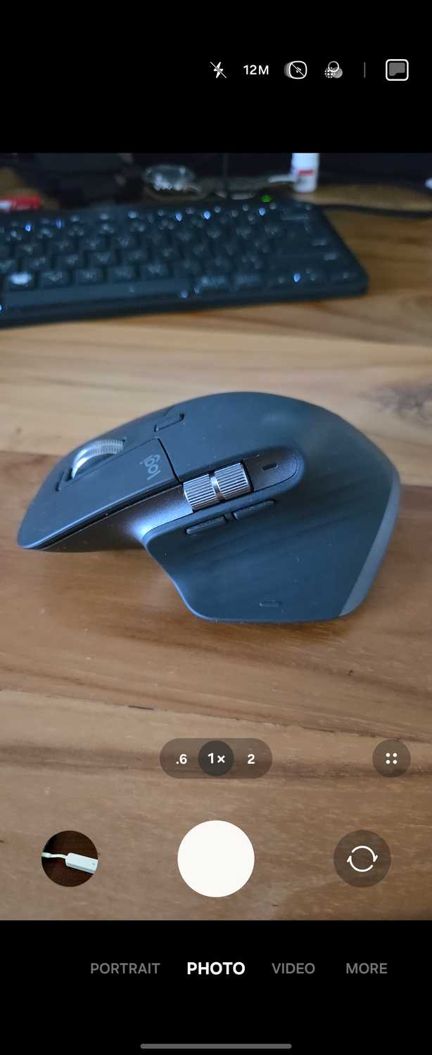 Gaming Mouse On Wooden Desk With Keyboard