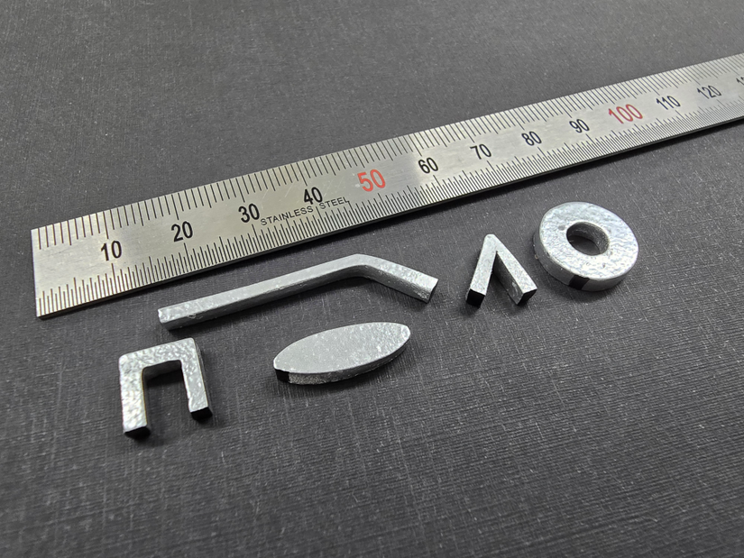 Stainless steel ruler and small metal shapes