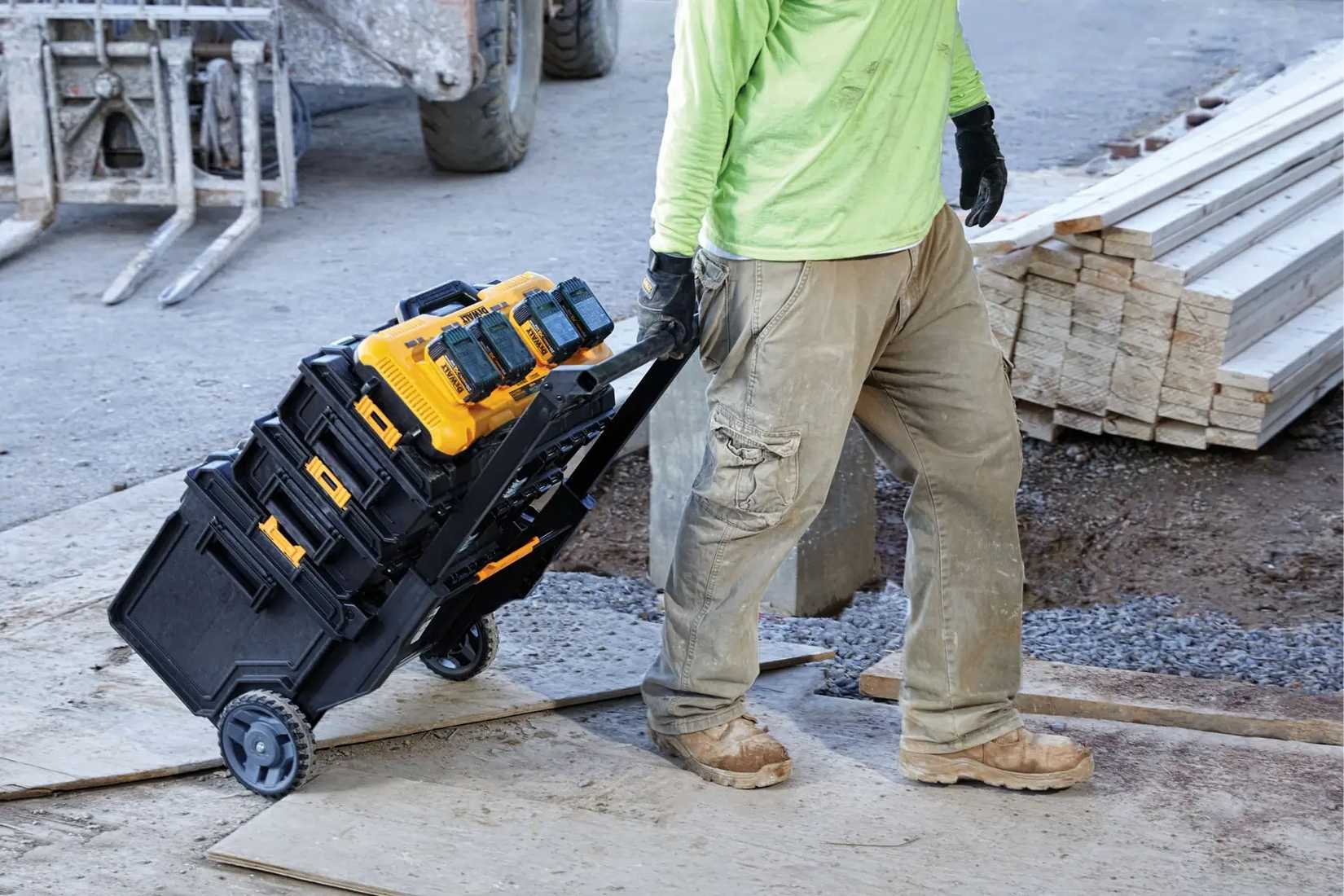 dewalt multi-charging kit being wheeled by construction worker