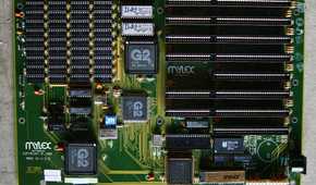 Vintage Mylex 80286 computer motherboard with expansion slots.