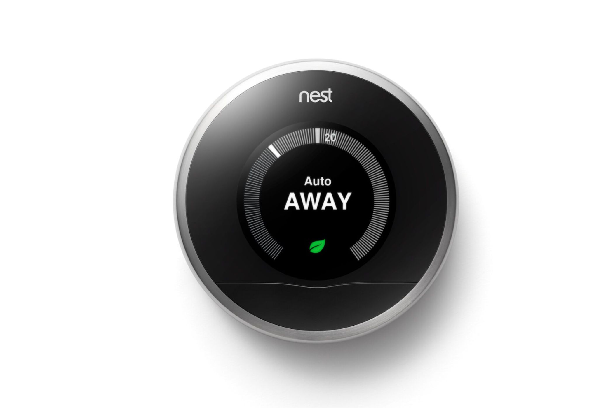 A first-generation Nest learning thermostat in a press image.