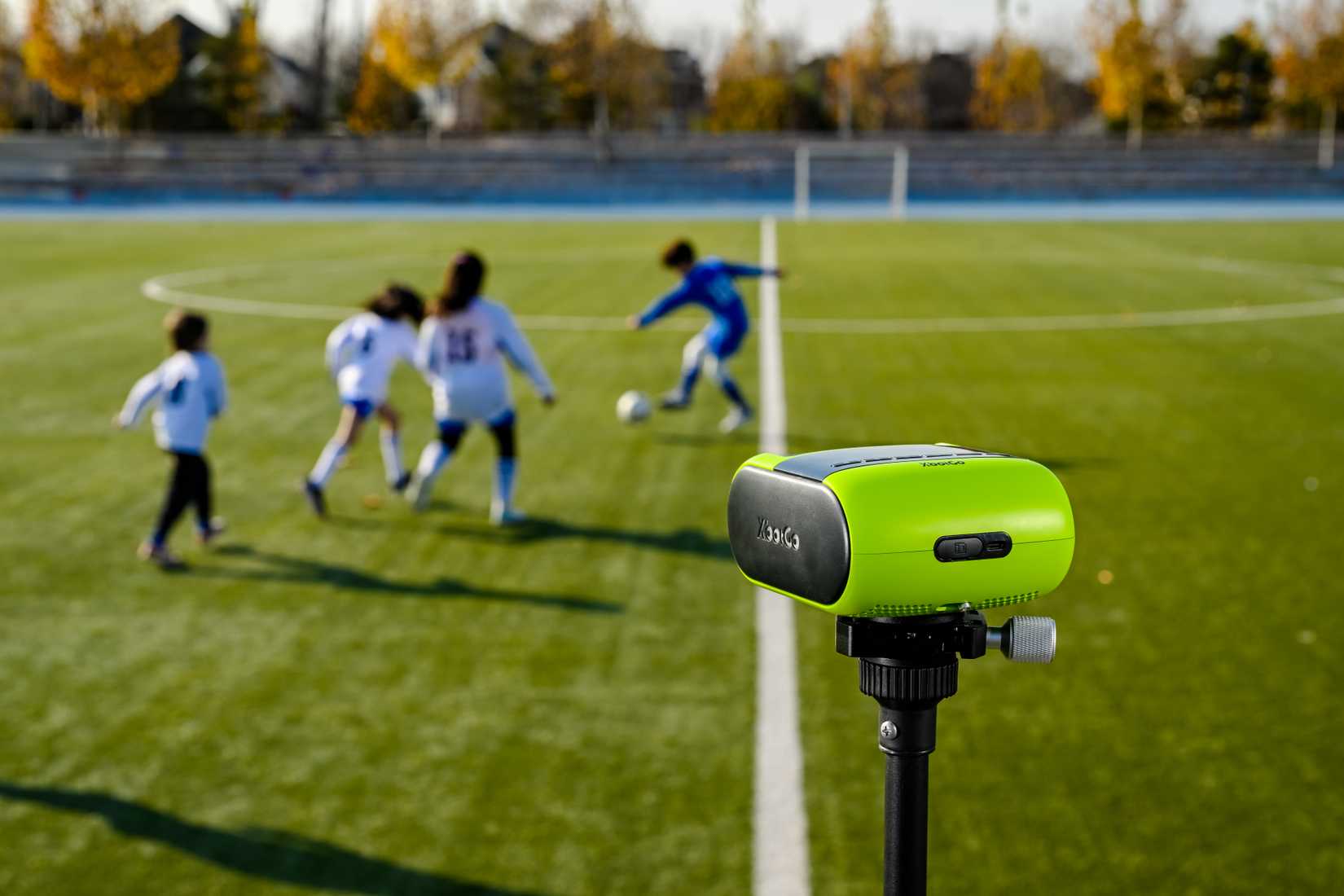 Rear view of the XbotGo Falcon camera recording a soccer game.