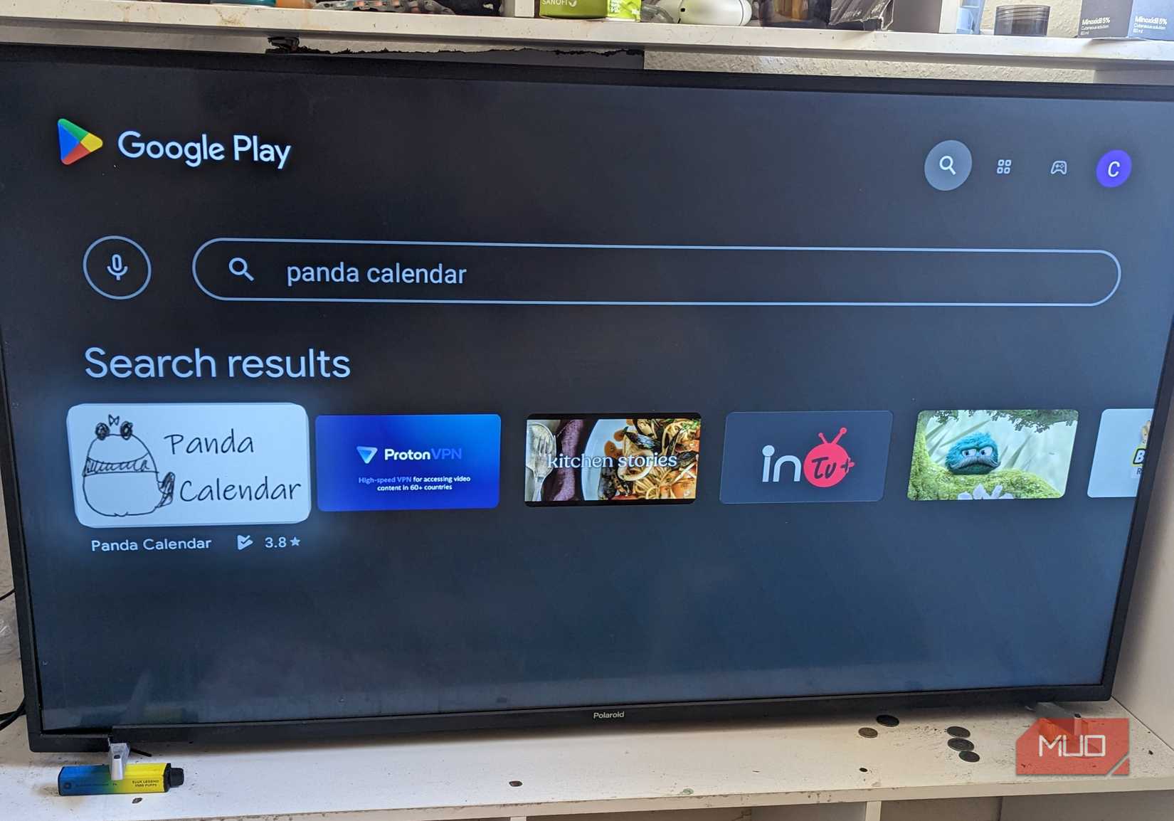 Android TV with Google Play Store search query to access Panda Calendar