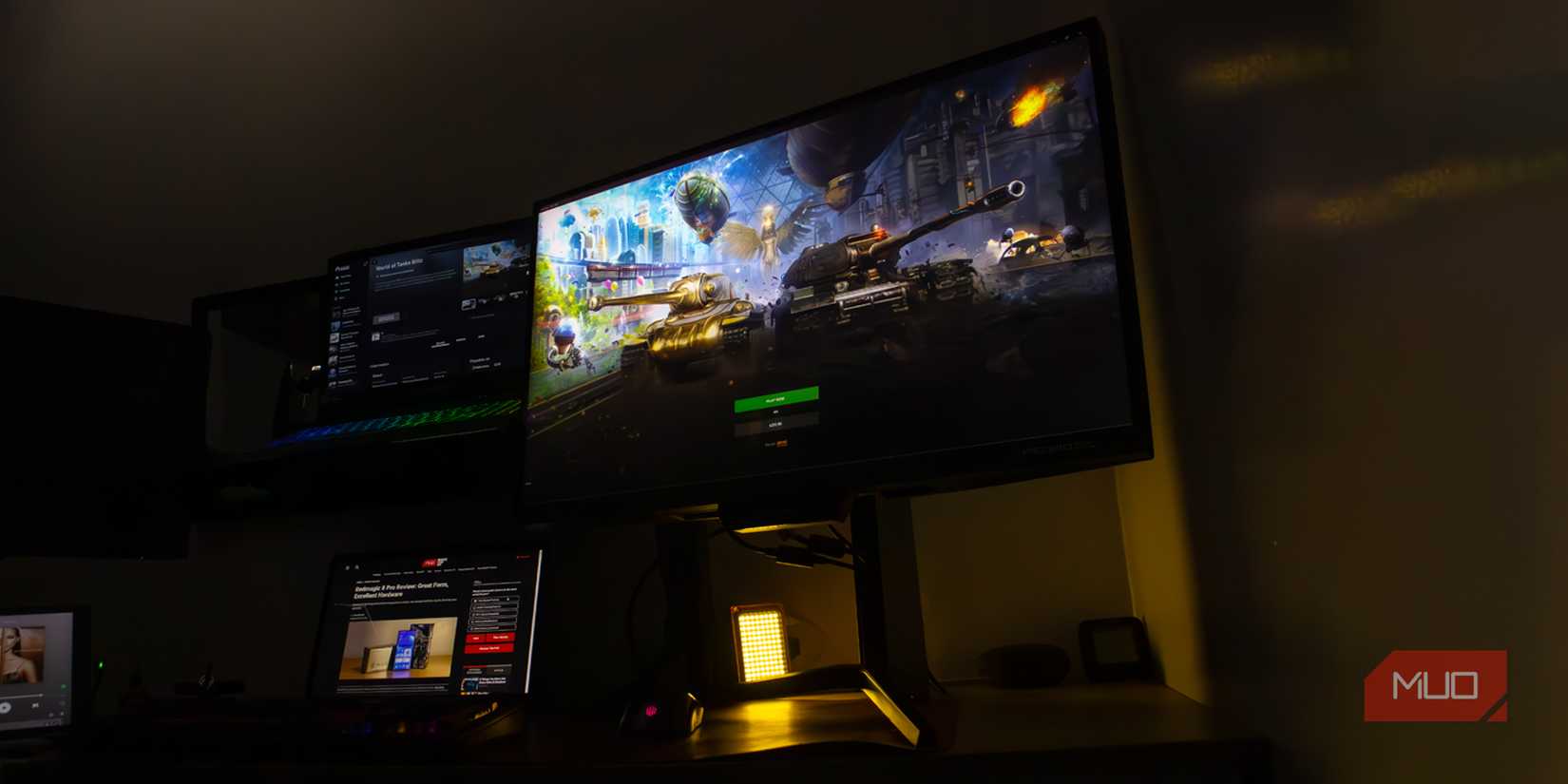 Redmagic 4K Gaming Monitor setup with two laptops.