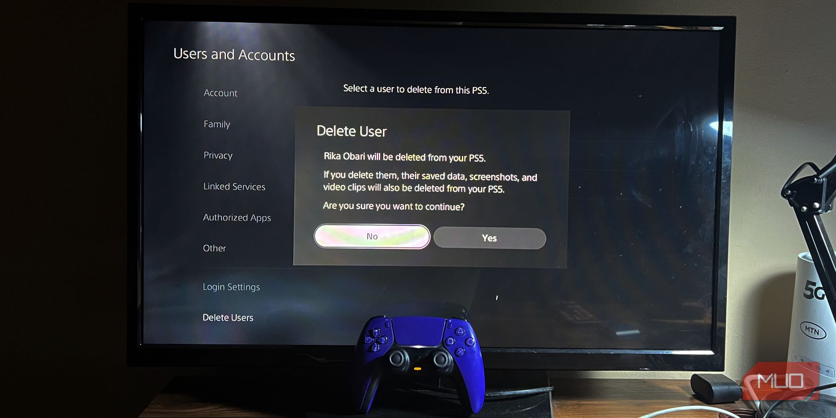 How To Delete PS5 User Accounts Television Displaying Prompt To Delete User On A Ps5 With A Controller On The Tv 