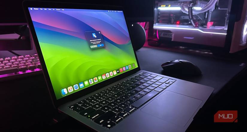 A third-party mouse next to a MacBook on a desk