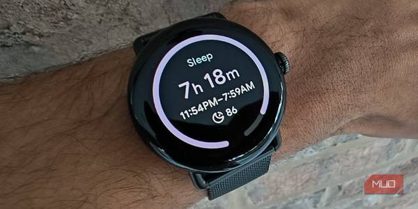 A Google Pixel Watch displaying time spent asleep and a sleep score