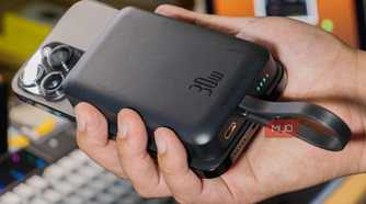 Baseus Magnetic Power Bank attached to an iPhone 14 Pro Max