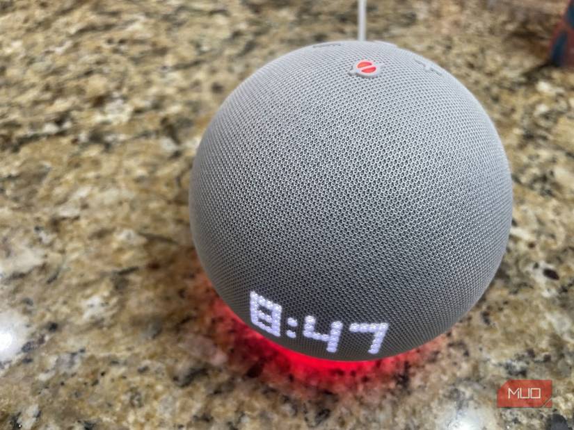 An Echo Dot with a red ring at the base