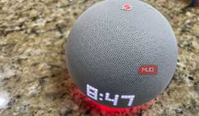 An Echo Dot with a red ring at the base