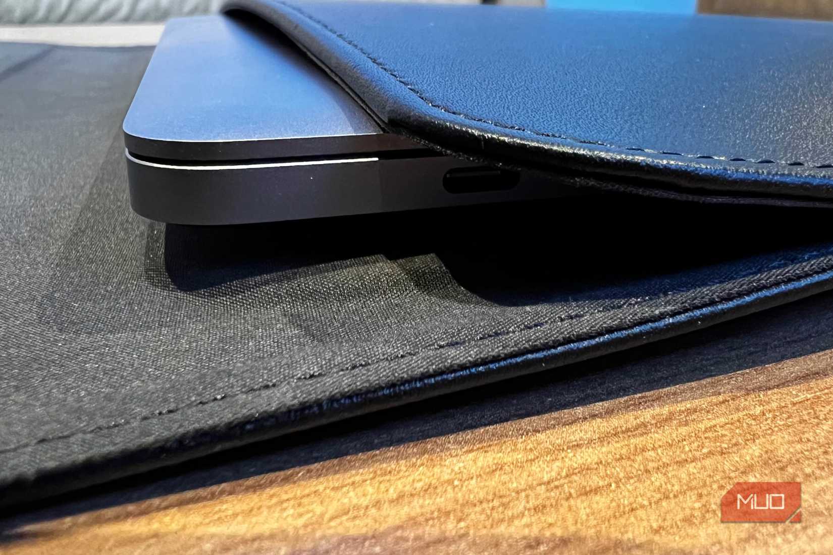 A laptop in an Orbitkey Hybrid Laptop sleeve.