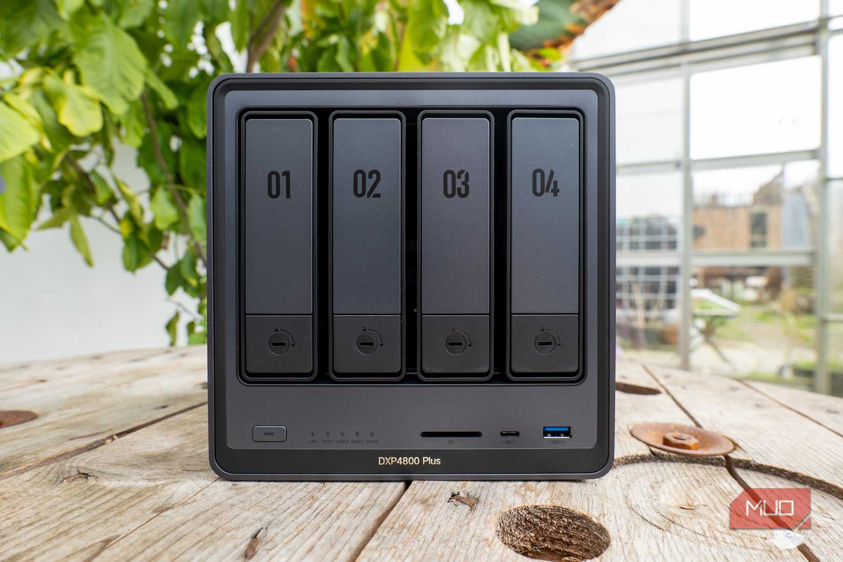 Ugreen DXP4800 Plus NAS on a wood table