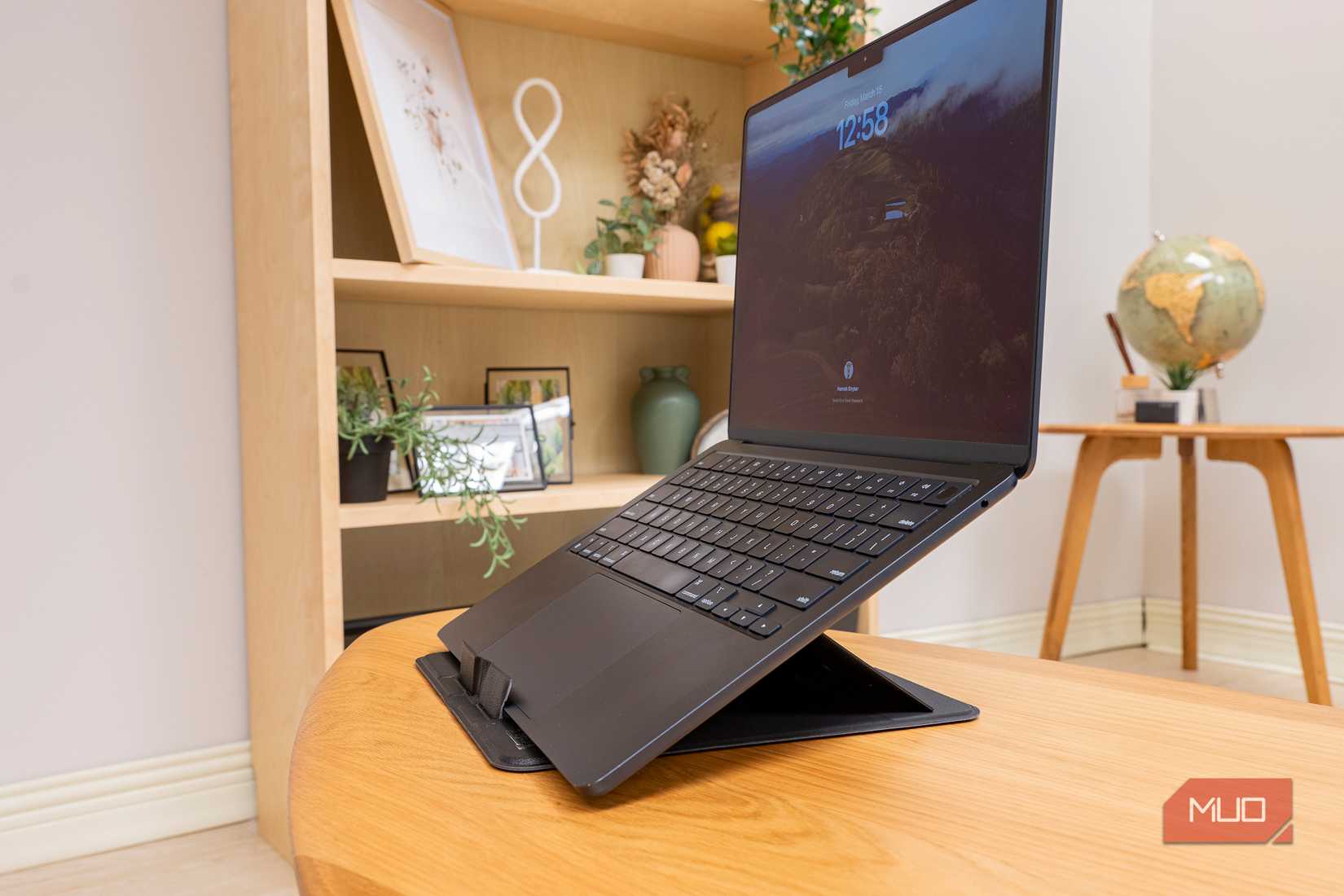A Macbook on the Plugable PT STANDX Foldable Stand