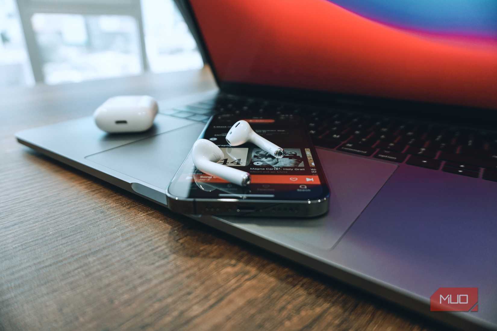 airpods on iphone with macbook