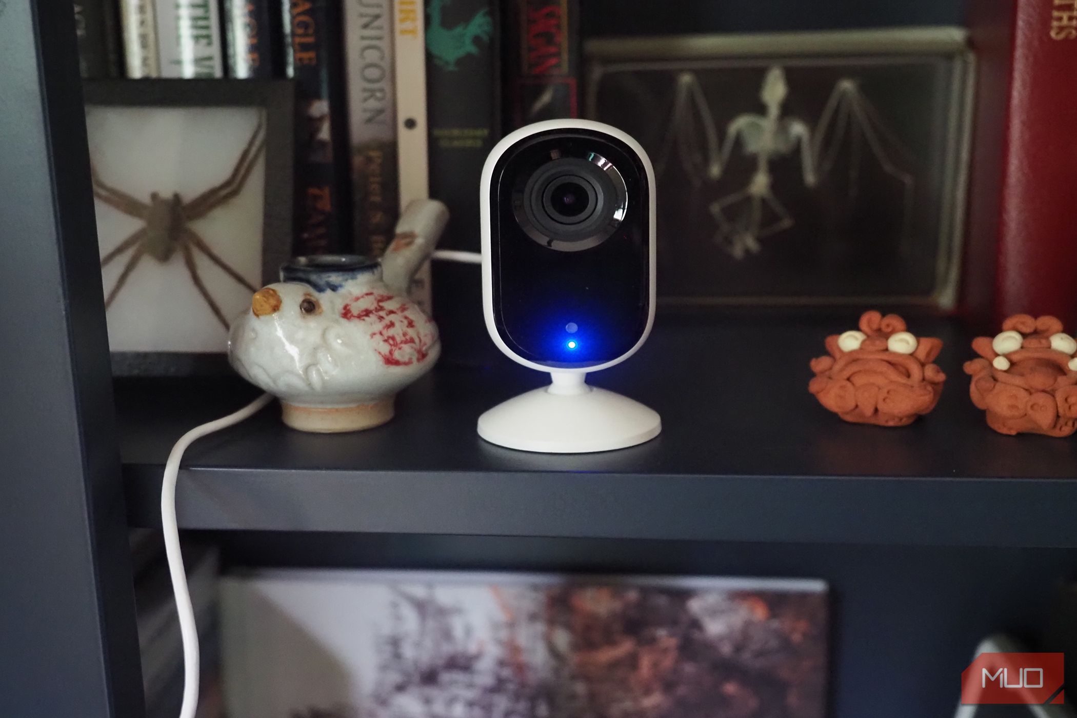 Arlo Essential Indoor Camera on a shelf