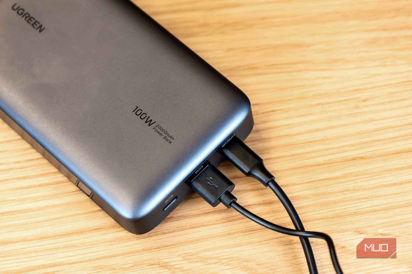 Input and output cables plugged into the a power-bank.