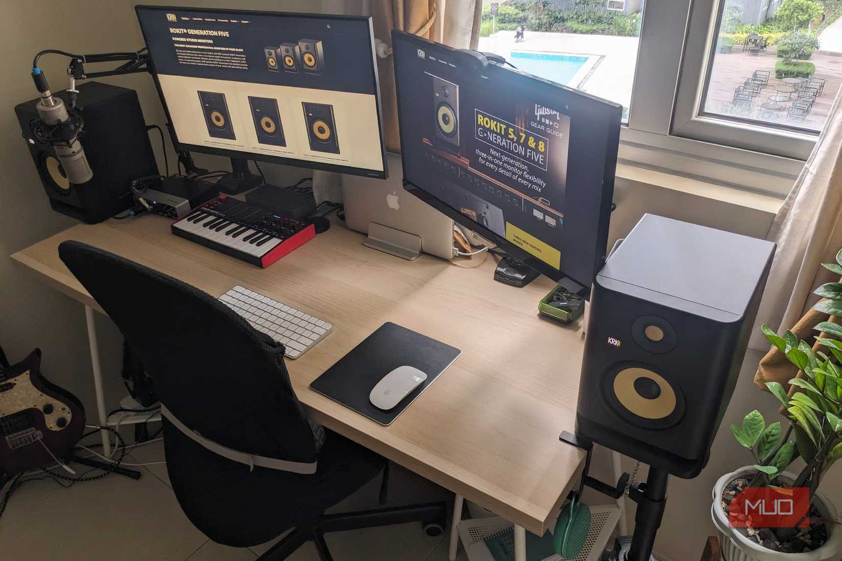 Two active speakers in a home studio environment.