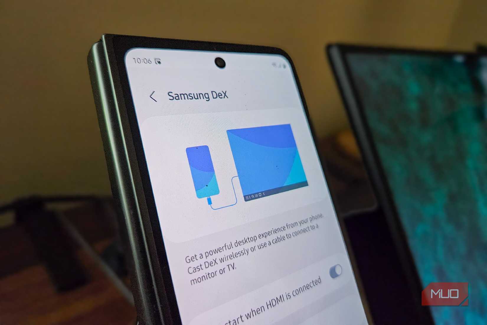 Samsung DeX on a Samsung Galaxy Z Fold 5 next to a portable monitor.
