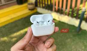 AirPods Pro 2 with case open being held in a man's hand