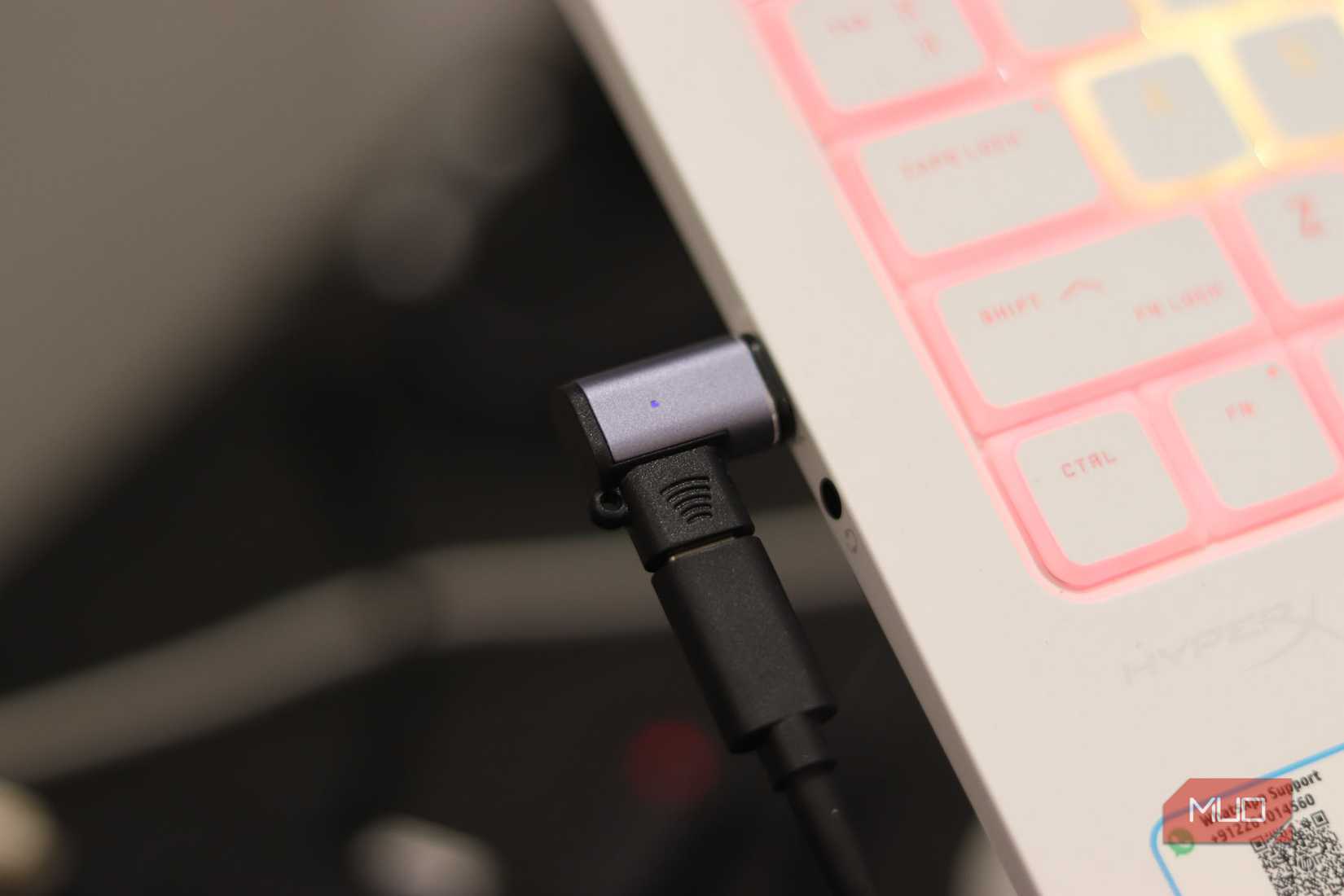 A Magnetic USB-C Connector plugged into a Thunderbolt 4 port