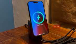 an iphone mounted on a magsafe wireless charger kept on a table