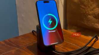 an iphone mounted on a magsafe wireless charger kept on a table