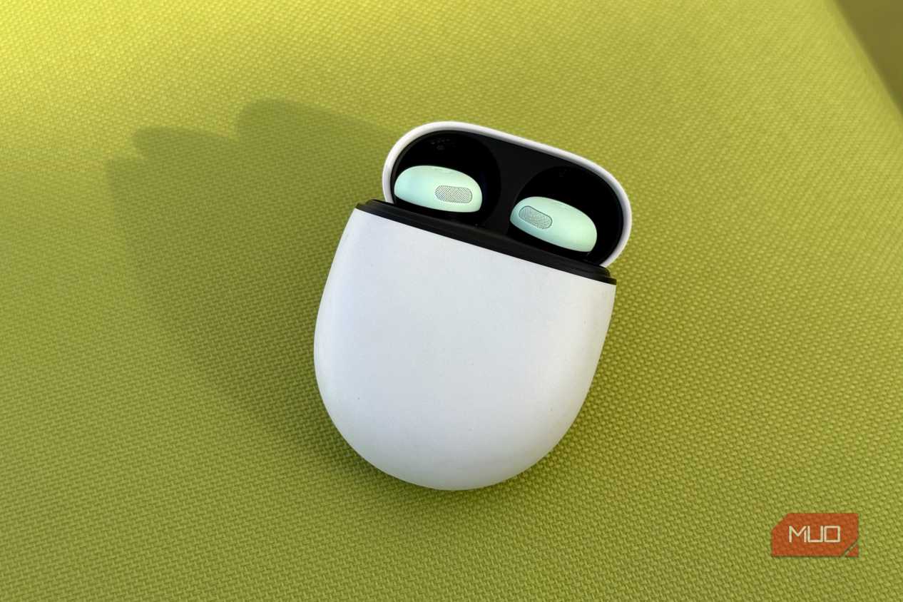 mint Pixel Buds Pro 2 on a green surface